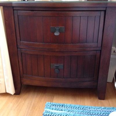 Several fine wood nightstands