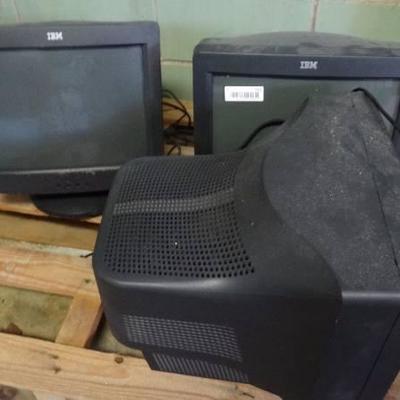 3 IBM computer monitors.