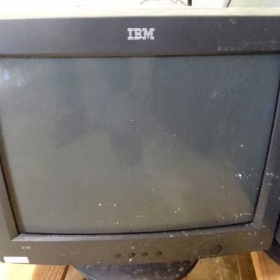 3 IBM computer monitors.