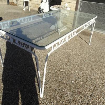 Lg glass top patio table w/ metal base
