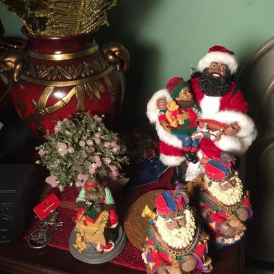Bunches of Collectible black Santas and angels
