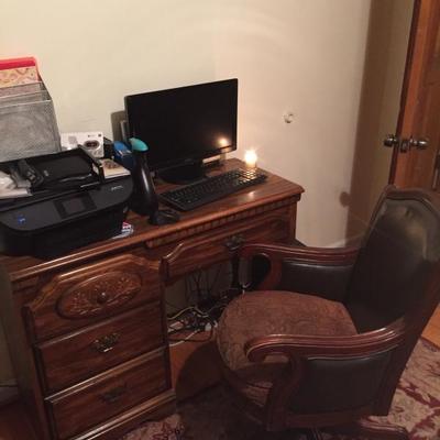 desk and upholstered desk chair
