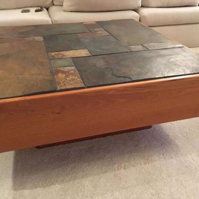large square coffee table with inlaid stone tile & pedestal base
