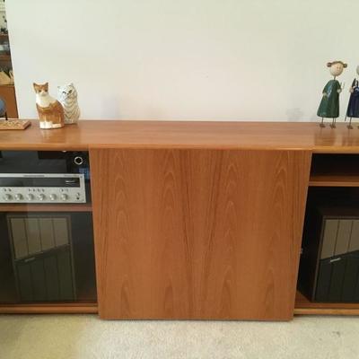 modern media console with sliding panel