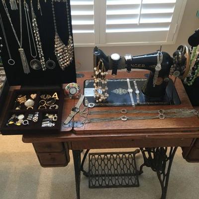 Costume jewelry & watches. (sewing machine not for sale)
