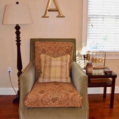 Upholstered chair with nailhead trim