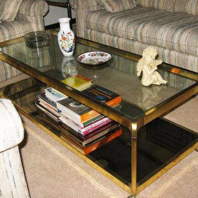 BUY IT NOW
brass and glass coffee table on wheels ! 