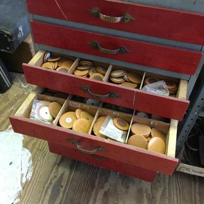 Chest full of different sizes of pads for instruments