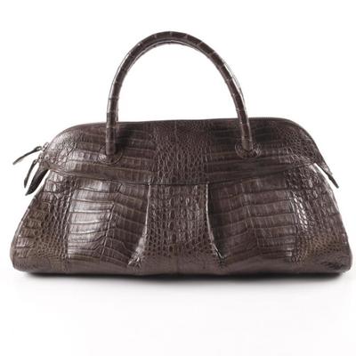 Rhonda Ochs Crocodile Leather Handbag   
https://www.ebth.com/items/7386280-rhonda-ochs-crocodile-leather-handbag