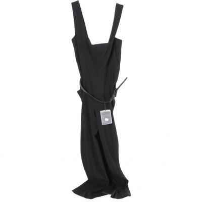 Women's Ainos Black Wool Jumpsuit 
https://www.ebth.com/items/7390108-women-s-ainos-black-wool-jumpsuit