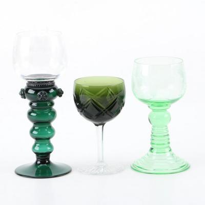 Antique Green Bohemian Glass Hock and Wine Stems   https://www.ebth.com/items/7389949-antique-green-bohemian-glass-hock-and-wine-stems