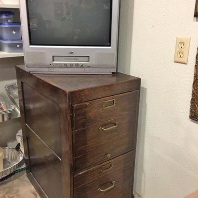 Oak file cabinet, several TVs.