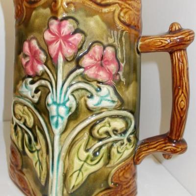 Square pitcher with flowers $95