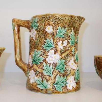 3 pieces of Majolica by George Jones 
Pitcher $350
Cream and sugar $300