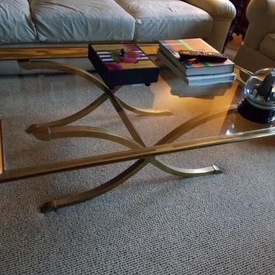 Brass and glass coffee table $495