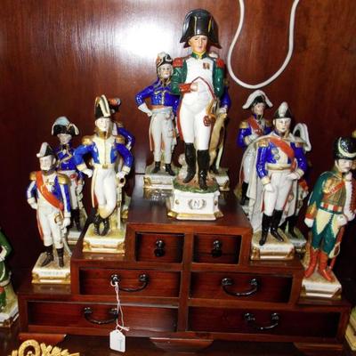 Collection of Napoleon figurines with stand $400