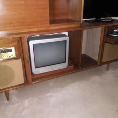 stereo equipment in the entertainment credenza