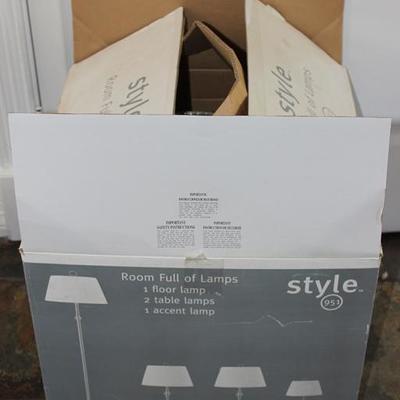 Set of 4 lamps, new in box, 1 floor lamp, 2 table  lamps, 1 accent lamp
