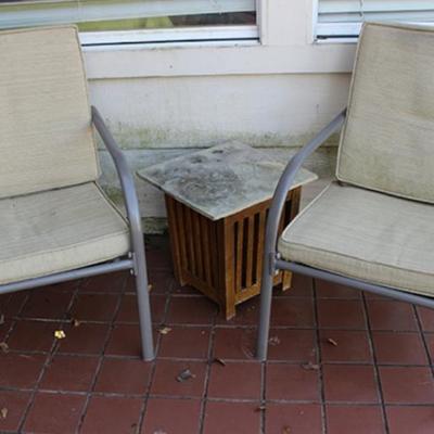Pair of outdoor chairs with cushions
