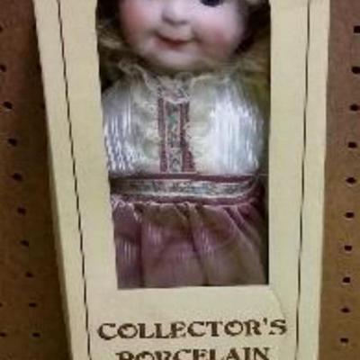 Vintage Porcelain Doll $1