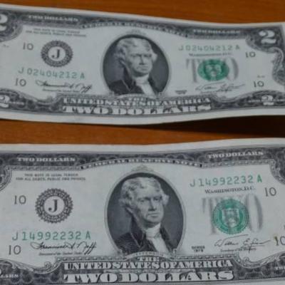 4 $2 bills - 1963, 1976, 1976, 1976.