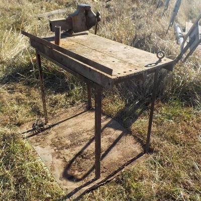 home made steel table w/ big antique Reed vice