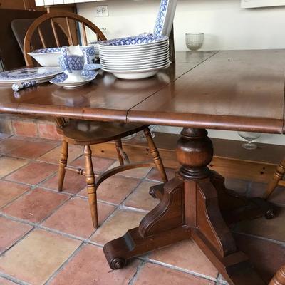   Solid Wood Vintage Pedestal Dining Table
            (44â€ x 68â€ with two leaves)
                            450.â€”