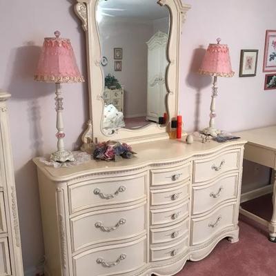 Bedroom furniture in excellent condition Huge set!  I will replace the photos that came out yellow 
Dresser 58 l x 18 w 