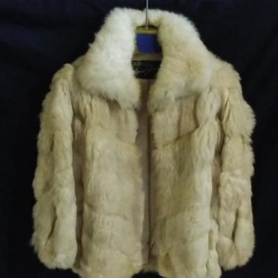  Mano Swartz Dutch White hip-length Fur Coat  http://www.ctonlineauctions.com/detail.asp?id=671820