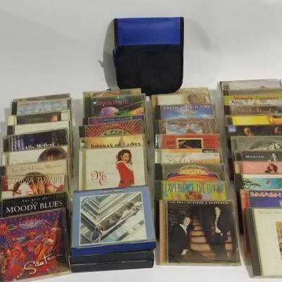 Nearly four dozen CDs plus zipper case  http://www.ctonlineauctions.com/detail.asp?id=671808
