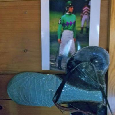 Signed female jockey saddle