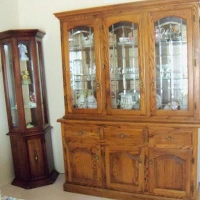 Large beveled glass and mirrored tiger oak hutch.