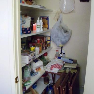 Vacuums, pantry items, ironing board, irons, candles, knick knacks, and more