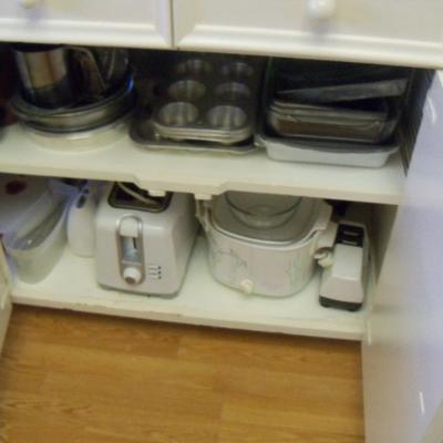 Toaster, crock pot, beaters, coffee pots, electric knife, blender, kitchen utensils, etc etc