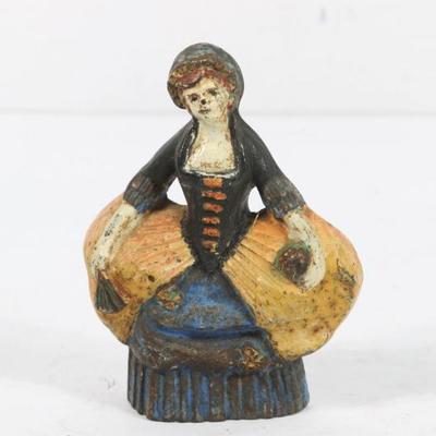 Painted Cast Iron Door Stop Depicting A Woman Wearing A Dress. 