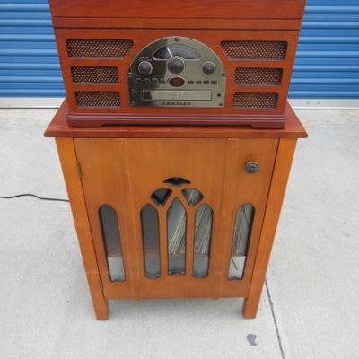 Vintage record player and record cabinet with records