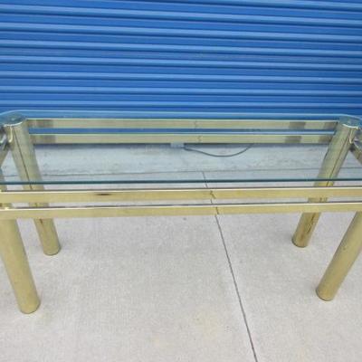 Glass top sofa table, with gold tone / brass legs and frame