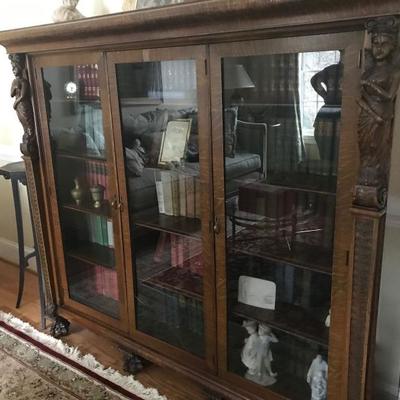 Antique oak china cabinet with claw feet