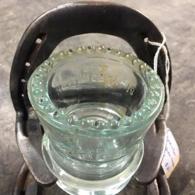 Insulator and horseshoe candle holders