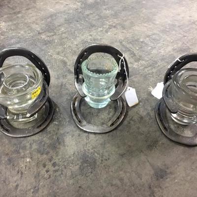 Insulator and horseshoe candle holders