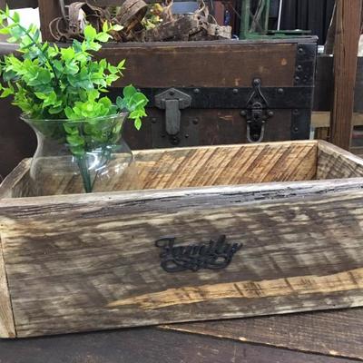 Wooden box with greenery