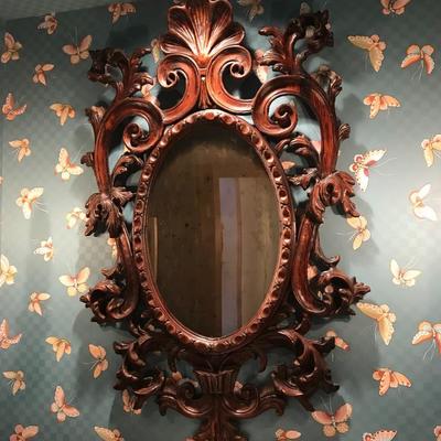 Carved mirror