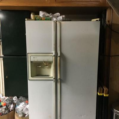 The white refrigerator works well, and it is FREE!