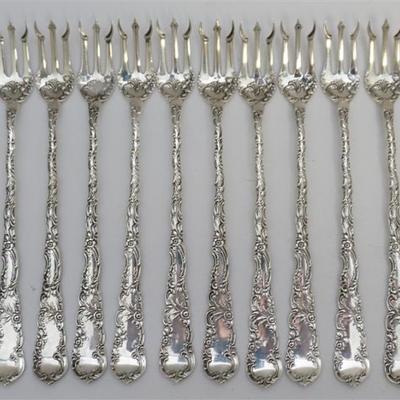 12 Antique c. 1893 Ornate Wendell Manufacturing Co. Sterling Silver Oyster Forks in the Rococo Pattern. Marked Sterling and with Wendell...