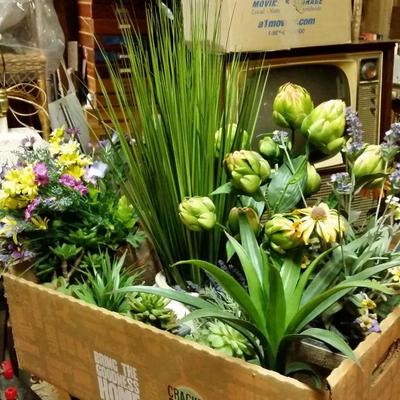 boxes of imitation floral arrangements, contemporary