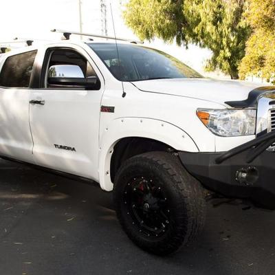 2013 Toyota Tundra Platinum CrewMax 4X4 4-door pickup truck. Loaded with upgrades and additions. This vehicle has every stock option for...
