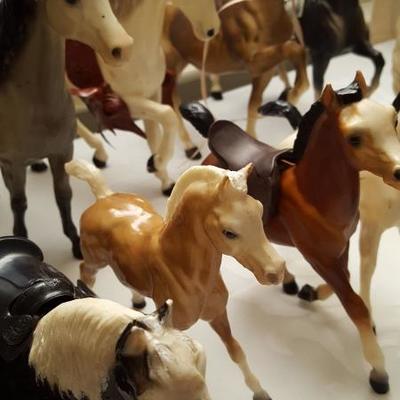 Some Breyer and unmarked Horses
