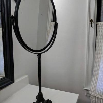 Bathroom oval mirror on stand