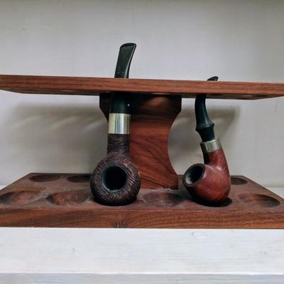 pipe stand with two wooden pipes