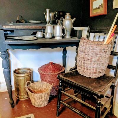 Black painted secretary desk, baskets, and pewter